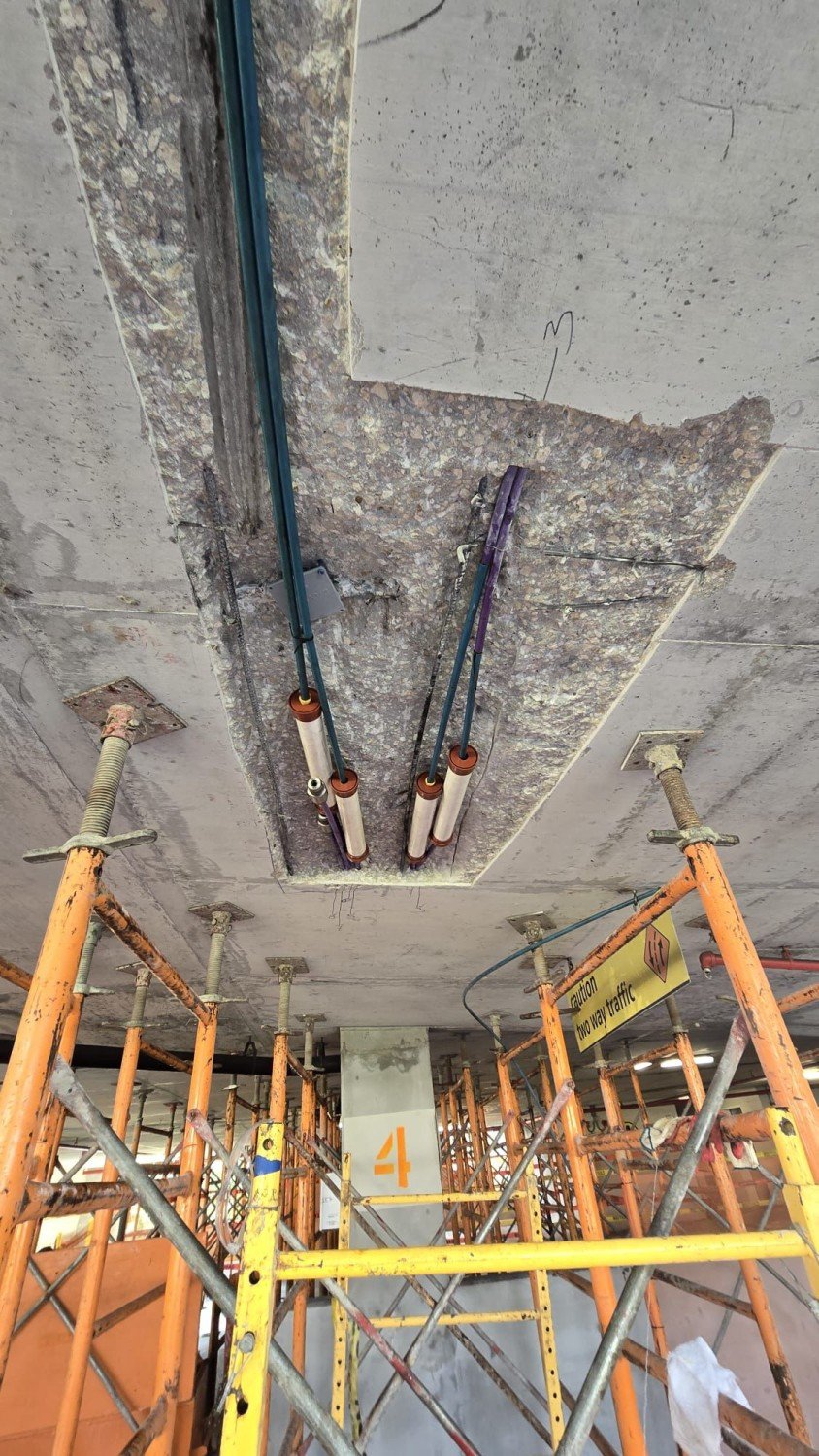 Post-tensioning is a particularly good example because so much of its work happens quietly inside the concrete.